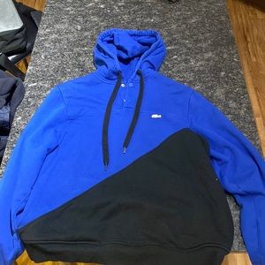 Lacoste men’s blue and black sweatshirt. Size 7. Fits smaller